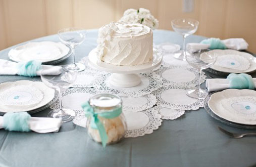 The centerpiece cakes double as your wedding cake brilliant and the doily