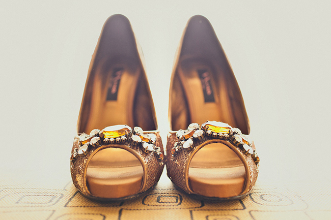 gold peep toe shoes with amber jewels on toes