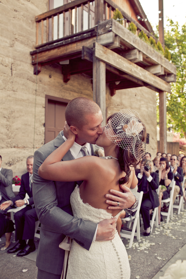 Bride and groom kiss