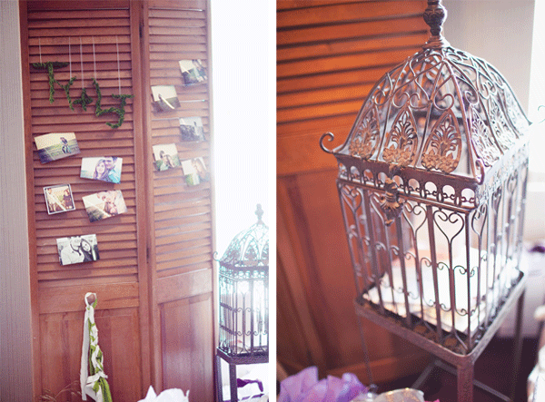 photos hanging on door; gilded bird cage