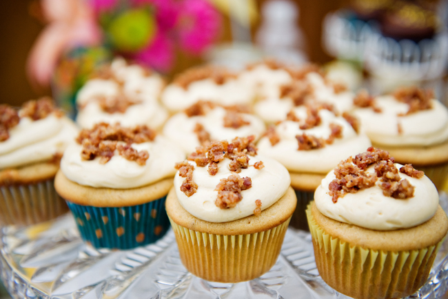 maple flavored cupcakes with bacon pieces on top