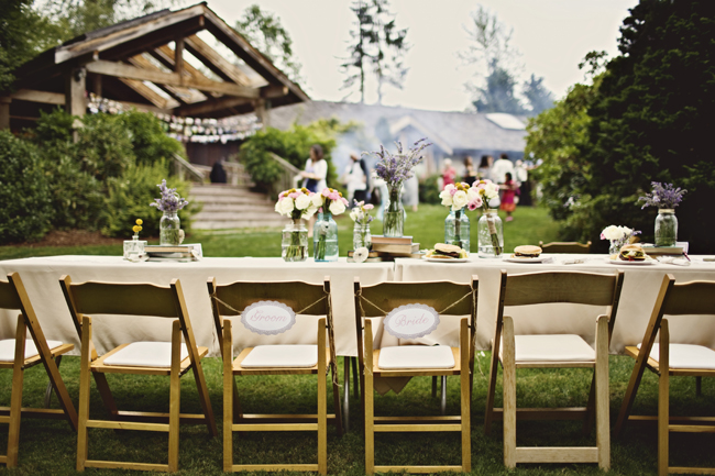 outdoor head table with signs