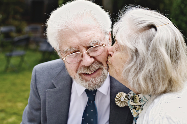 grandparents kiss on the cheek