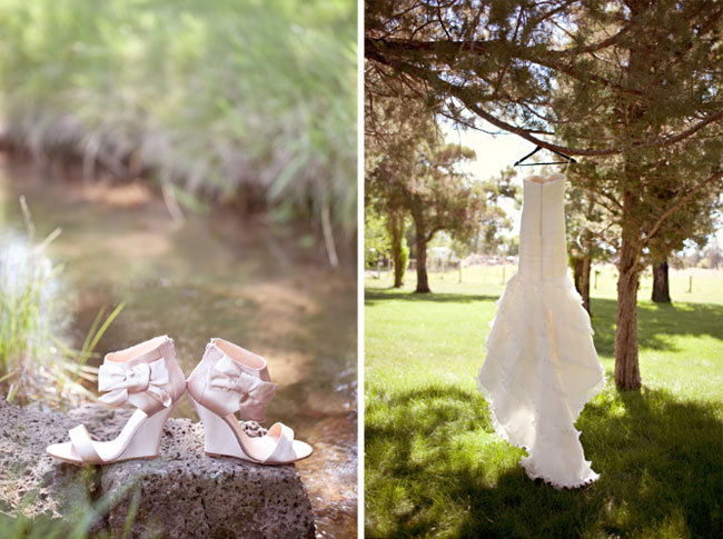 light pink bridal shoes on rock near stream, dress hanging from tree branch