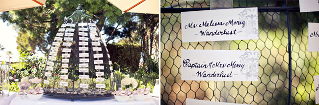 giant birdcage with wedding seating cards