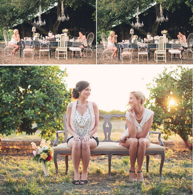 two friends sit at outdoor styled tea party
