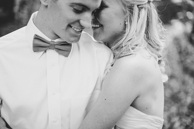 closeup black and white photo of bride and groom
