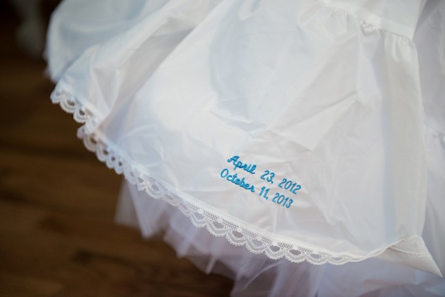 Blue embroidery of wedding date in crinoline 