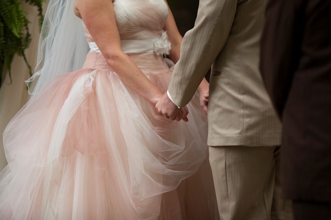 bride in blush wedding gown