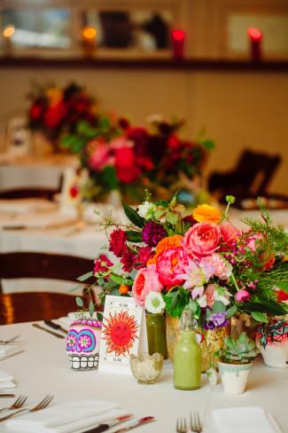 Day of the Day themed Wedding reception at Palm Door with pink yellow green flowers