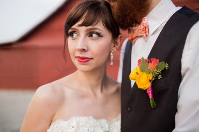 closeup of boutonniere and bride