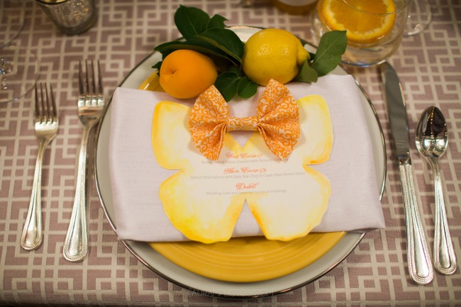 place setting with paper butterfly menu and bowtie