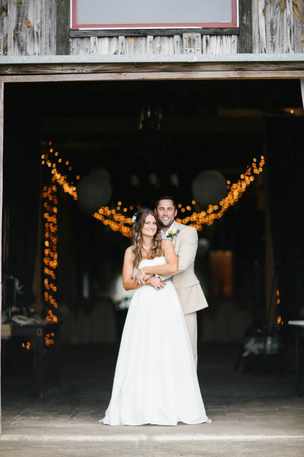 17 Bride and groom embracing in barn at Lindsey Plantation in Greer SC wedding