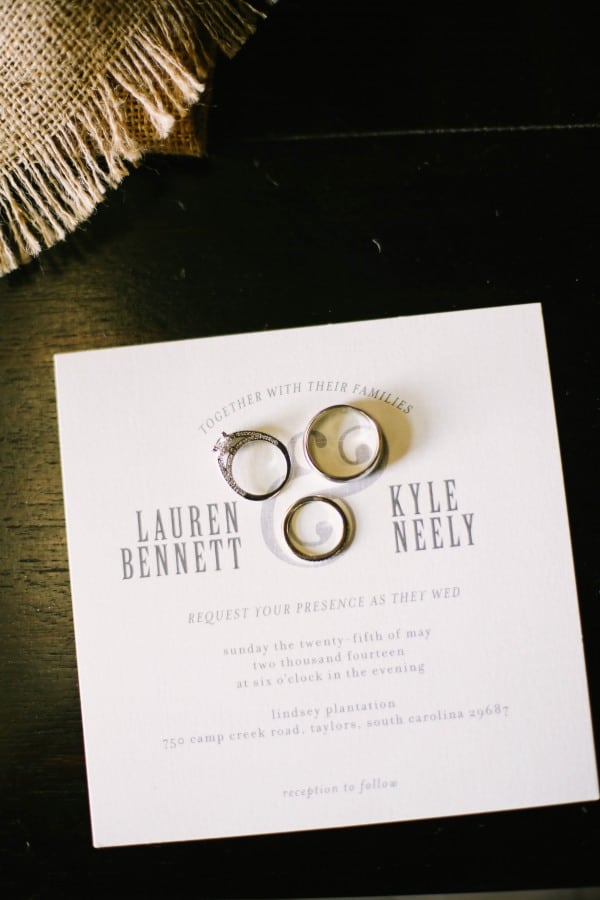 6 Minted wedding invitation and wedidng bands on top at  Lindsey Plantation in Greer SC swedding