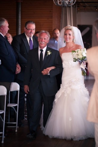 25 bride walking down aisle with father in mermaid dress