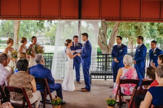 bride and groom during outdoor ceremony at Winter Park Farmers Market