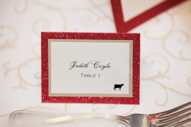 Red sparkle escort card for wedding reception 
