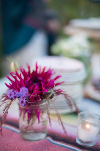 mason jar with purple and violet flowers