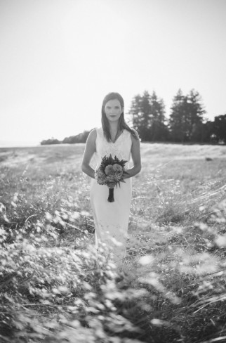 black and white photo of model in field
