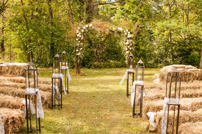 Chic Country Wedding At Le Tree Lane B Outdoor Wedding Ceremony With Hay Bales And Lanterns For Decor