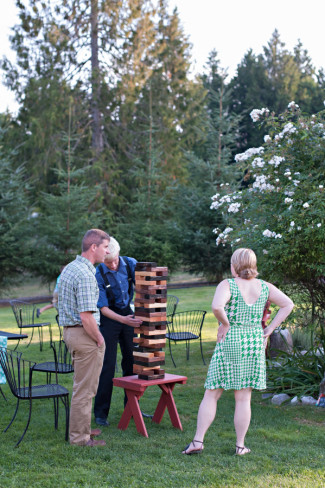 Wedding guests playing large jenga 