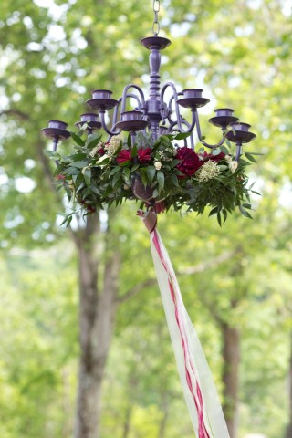 Black chandelier with pink ribbons and floral from Endless Creations Flowers