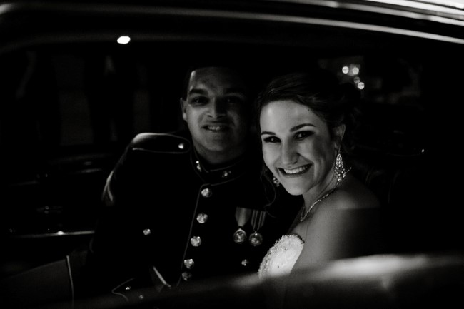 Bride and groom in the limo after the wedding captured by Jeff Hall Photography