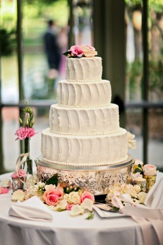 wedding cake on silver round stand
