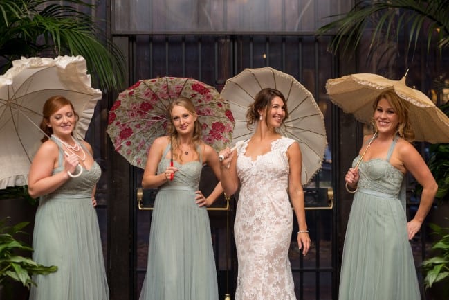 mismatched parasols for bride and bridesmaids