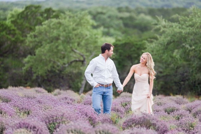 couple walk in lavender rows