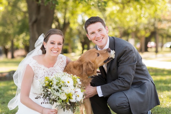 newlyweds with their dog