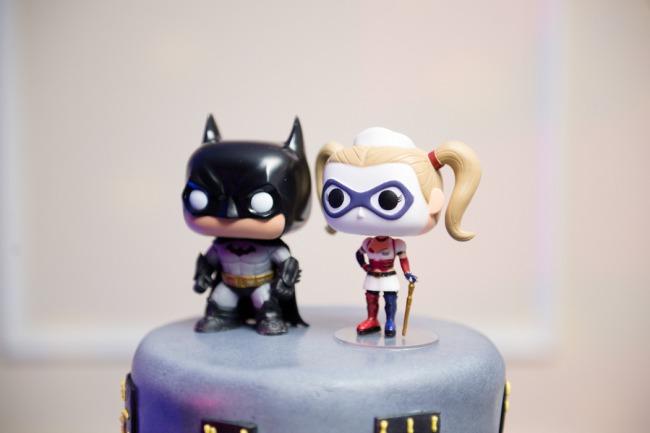 cartoon batman and wonder woman cake topper