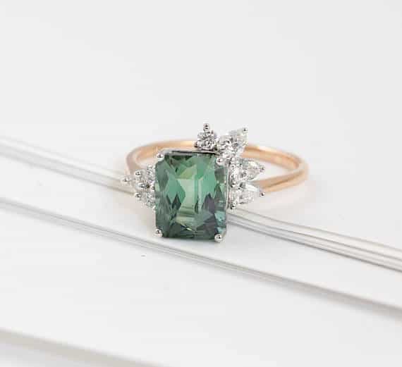Emerald cut mint Tourmaline with off-set diamond details, Contemporary design ring with custom gemstone in 18k white gold, 18k rose gold.