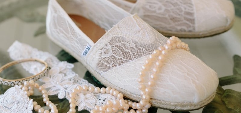 White-Lace-Toms-bridal-flats with pearls draped overtop
