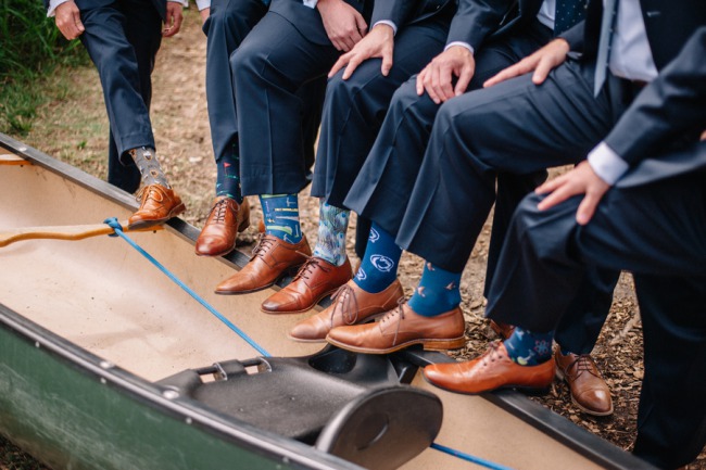 groomsmen show fun socks with brown shoes