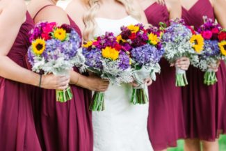 bridesmaids in red dresses