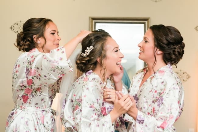 wedding morning bridal party getting ready in dressing gowns