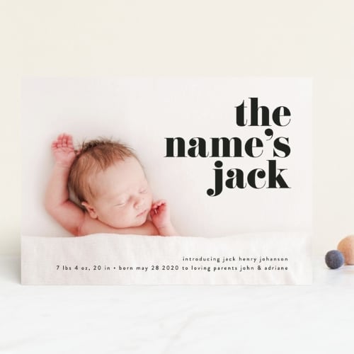 Cute baby newborn on card announcement