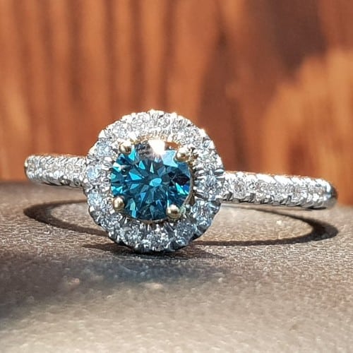 white gold halo blue diamond ring