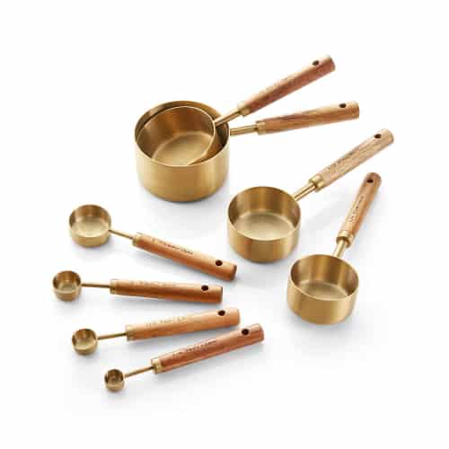 gold dry measuring cups and spoons