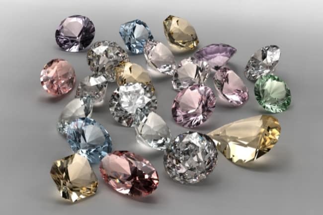 group of loose colored diamonds