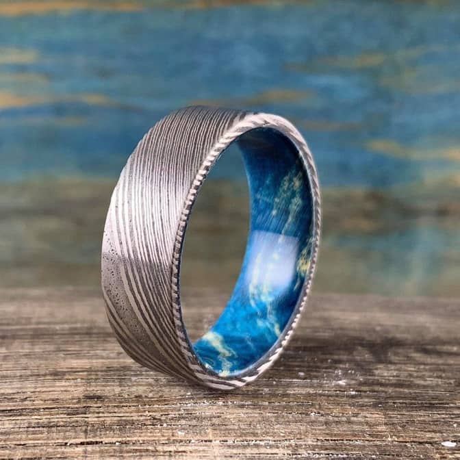 Polished Damascus Steel Ring with Blue Wood