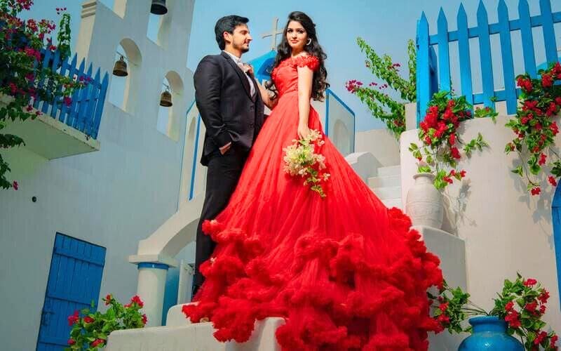 A Bride and Groom Standing on an Outdoor Staircase