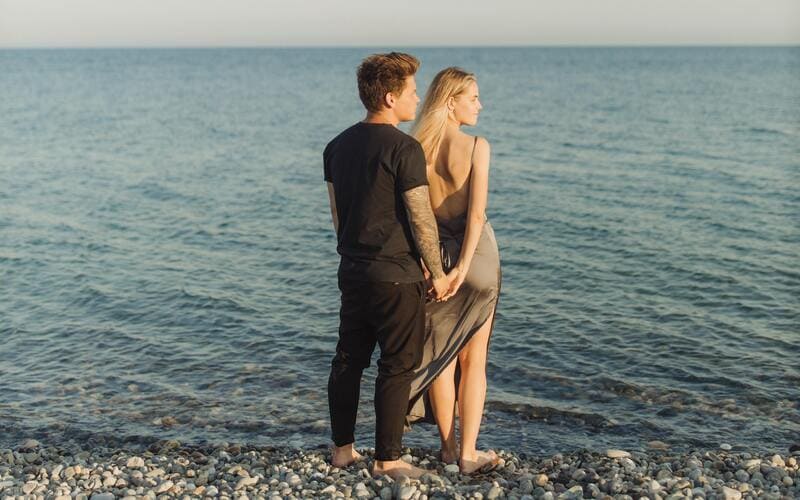 Couple Standing on Beach