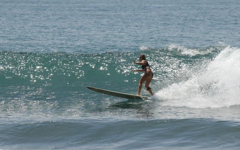 A girl doing surfing