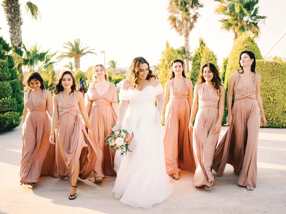 Bride and the Bridesmaids in Light Pink Dresses
